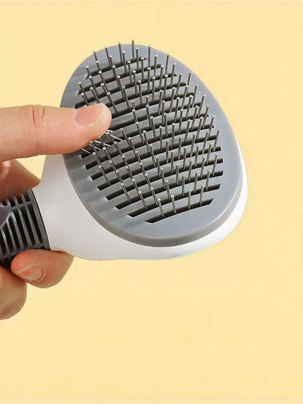 7479cf08-f191-45d9-aa46-ef6228635b7f-Max-Origin self-cleaning pet hair remover brush